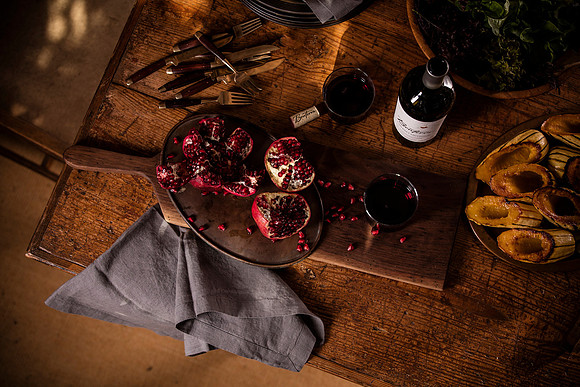 pomegranate-table-setting-wine-roasted-vegetables