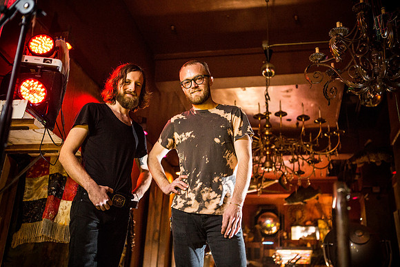 people-two-men-band-venue-chandelleirs-lights